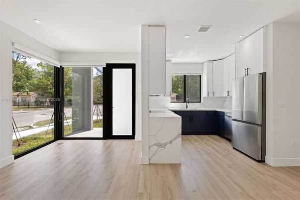Interior, Kitchen, Marble Walls, Recessed Lighting, Wood Texture Flooring