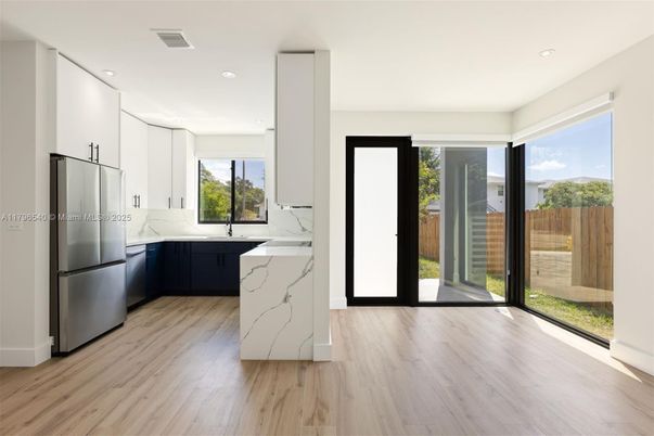 Interior, Kitchen, Marble Walls, Recessed Lighting, Wood Texture Flooring