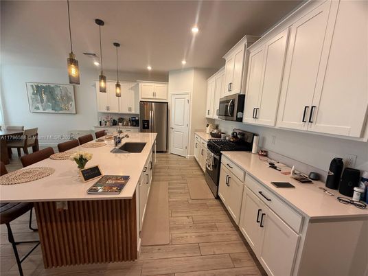 Interior, Kitchen, Pendant Lights, Recessed Lighting, Stainless Steel Appliances, Wood Texture Flooring