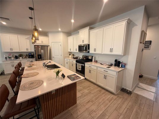 Interior, Kitchen, Pendant Lights, Recessed Lighting, Stainless Steel Appliances, Wood Texture Flooring