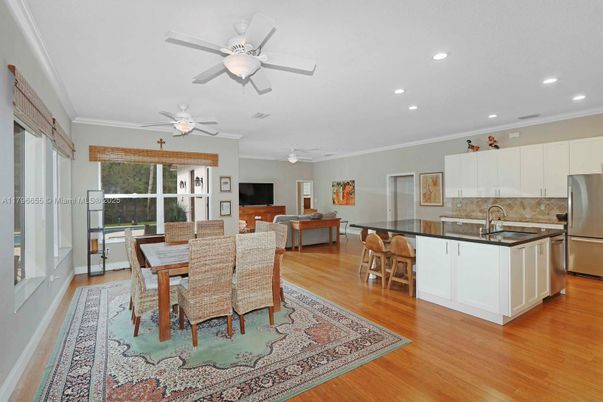 Dining room, Interior, Kitchen, Recessed Lighting, Stainless Steel Appliances, Wood Texture Flooring