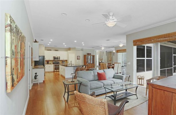 Dining room, Interior, Kitchen, Living room, Recessed Lighting, Stainless Steel Appliances, Wood Texture Flooring