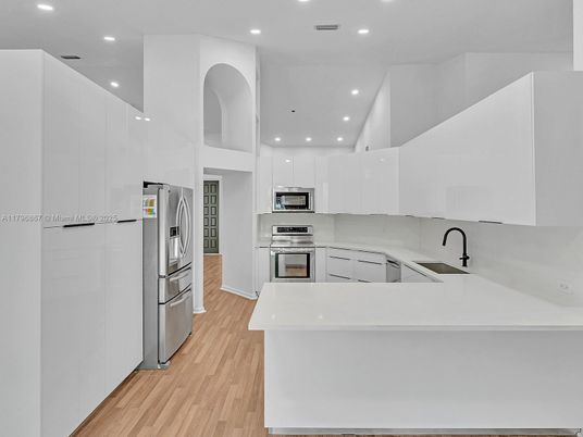 Interior, Kitchen, Recessed Lighting, Stainless Steel Appliances, Wood Texture Flooring
