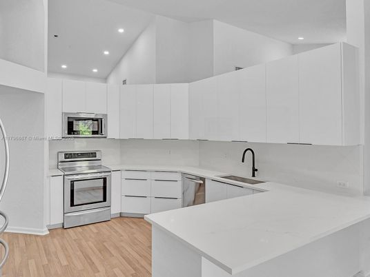 Interior, Kitchen, Recessed Lighting, Stainless Steel Appliances, Wood Texture Flooring