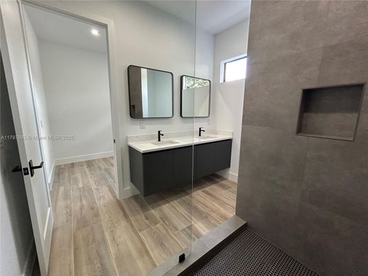 Bathroom, Dual Sink Vanities, Interior, Pendant Lights, Recessed Lighting, Wood Texture Flooring