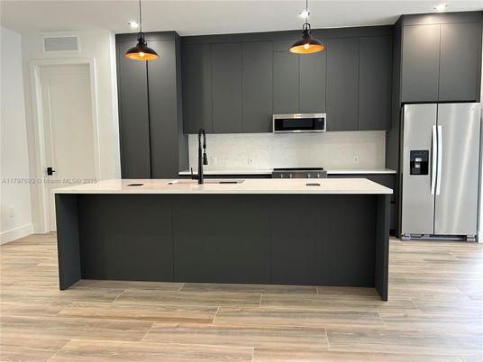 Interior, Kitchen, Pendant Lights, Recessed Lighting, Stainless Steel Appliances, Wood Texture Flooring