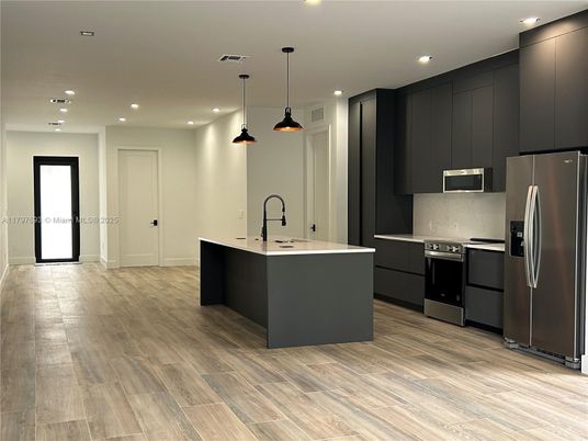 Interior, Kitchen, Pendant Lights, Recessed Lighting, Stainless Steel Appliances, Wood Texture Flooring