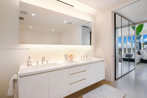 Bathroom, Dual Sink Vanities, Interior, Recessed Lighting, Wood Texture Flooring