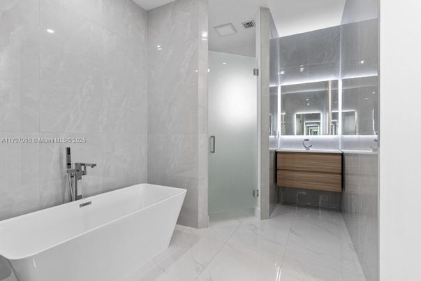 Bathroom, Free Standing Baths, Interior, Marble, Marble Walls, Recessed Lighting