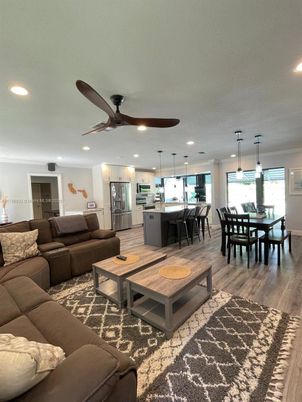 Dining room, Interior, Kitchen, Living room, Pendant Lights, Recessed Lighting, Stainless Steel Appliances, Wood Texture Flooring