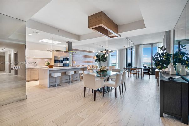Dining room, Interior, Kitchen, Pendant Lights, Recessed Lighting, Stainless Steel Appliances, Water, Wood Texture Flooring