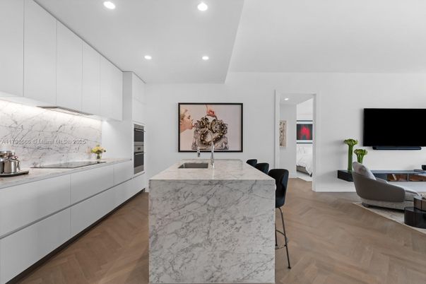 Interior, Kitchen, Marble Walls, Recessed Lighting, Stainless Steel Appliances, Wood Texture Flooring