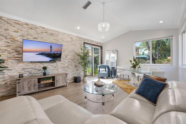 Dining room, Interior, Living room, Pendant Lights, Recessed Lighting, Stone Walls, Wood Texture Flooring