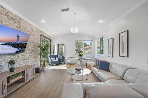 Dining room, Interior, Living room, Pendant Lights, Recessed Lighting, Stone Walls, Wood Texture Flooring