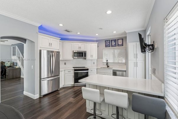 Interior, Kitchen, Recessed Lighting, Stainless Steel Appliances, Wood Texture Flooring