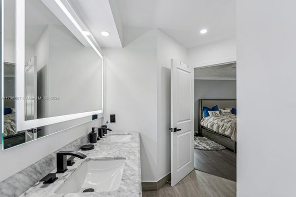 Bathroom, Bedroom, Dual Sink Vanities, Interior, Recessed Lighting, Wood Texture Flooring