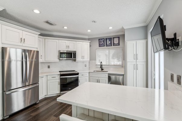 Interior, Kitchen, Recessed Lighting, Stainless Steel Appliances, Wood Texture Flooring