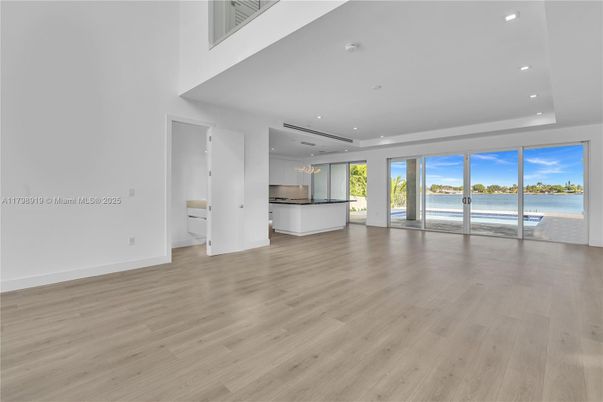Empty room, Interior, Kitchen, Pendant Lights, Recessed Lighting, Water, Wood Texture Flooring