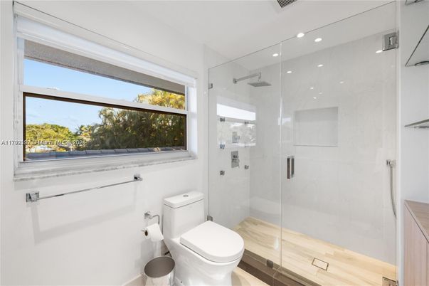 Bathroom, Glass Shower, Interior, Marble Walls, Recessed Lighting, Wood Texture Flooring