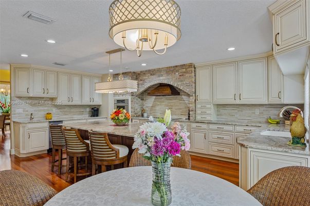 Chandelier, Interior, Kitchen, Pendant Lights, Recessed Lighting, Stone Walls, Wood Texture Flooring