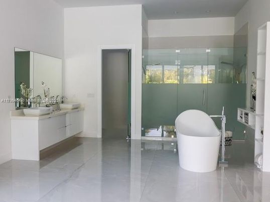 Bathroom, Dual Sink Vanities, Free Standing Baths, Glass Shower, Interior, Marble, Recessed Lighting