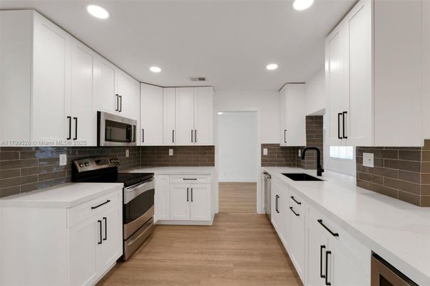 Interior, Kitchen, Recessed Lighting, Stainless Steel Appliances, Wood Texture Flooring