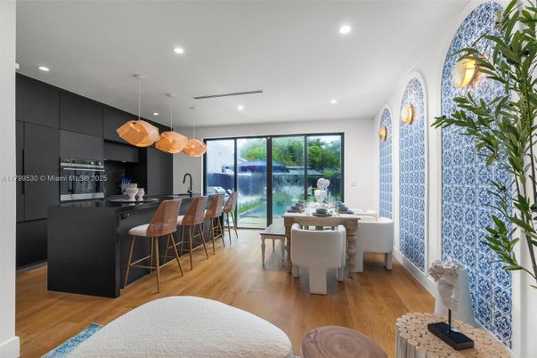 Dining room, Interior, Kitchen, Pendant Lights, Recessed Lighting, Stainless Steel Appliances, Wood Texture Flooring