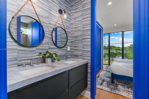 Bathroom, Dual Sink Vanities, Interior, Recessed Lighting, Wood Texture Flooring