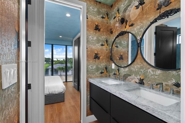 Bathroom, Dual Sink Vanities, Interior, Recessed Lighting, Wood Texture Flooring