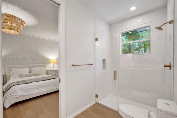 Bathroom, Bedroom, Glass Shower, Interior, Recessed Lighting, Wood Texture Flooring