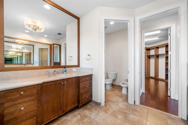 Bathroom, Dual Sink Vanities, Interior, Recessed Lighting, Wood Texture Flooring