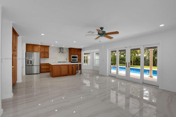 Interior, Kitchen, Marble Walls, Recessed Lighting, Stainless Steel Appliances