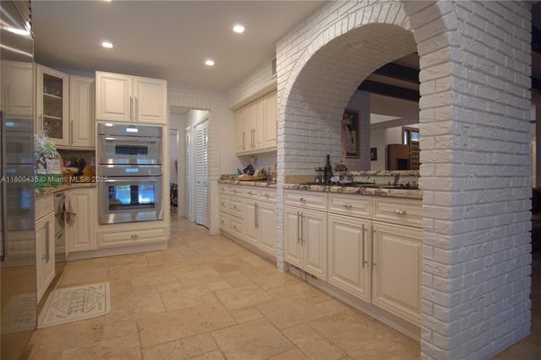 Interior, Kitchen, Recessed Lighting, Stainless Steel Appliances, Stone Walls