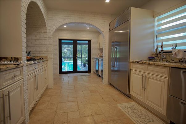 Interior, Kitchen, Recessed Lighting, Stainless Steel Appliances, Stone Walls