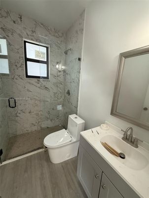 Bathroom, Glass Shower, Interior, Marble Walls, Wood Texture Flooring
