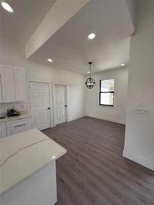 Empty room, Interior, Kitchen, Pendant Lights, Recessed Lighting, Wood Texture Flooring