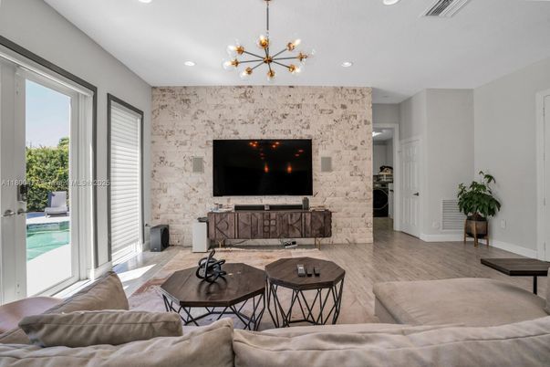 Interior, Living room, Pendant Lights, Recessed Lighting, Stone Walls, Wood Texture Flooring