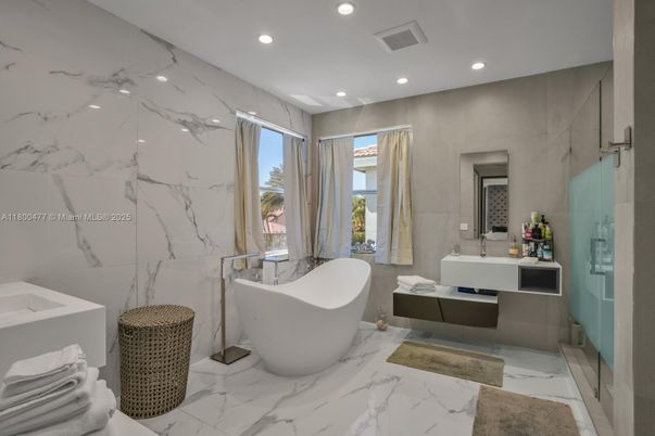 Bathroom, Free Standing Baths, Glass Shower, Interior, Marble, Marble Walls, Recessed Lighting