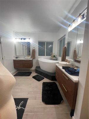 Bathroom, Dual Sink Vanities, Free Standing Baths, Interior, Wood Texture Flooring