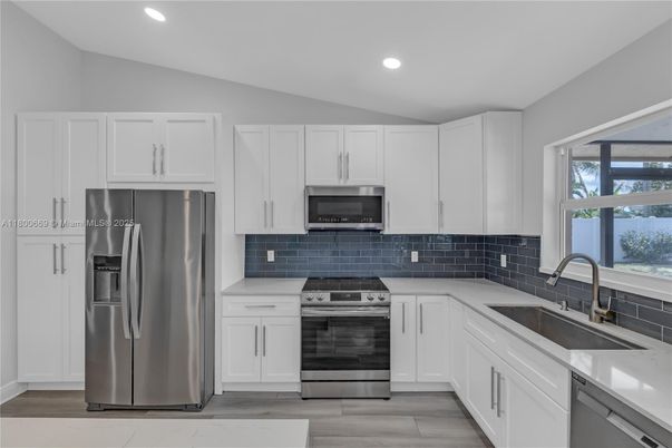 Interior, Kitchen, Recessed Lighting, Stainless Steel Appliances, Wood Texture Flooring