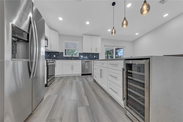 Interior, Kitchen, Pendant Lights, Recessed Lighting, Stainless Steel Appliances, Wood Texture Flooring