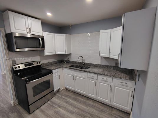 Interior, Kitchen, Recessed Lighting, Stainless Steel Appliances, Wood Texture Flooring