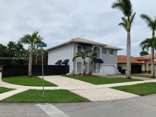 Attached, Exterior, Facade, Spanish Mediterranean