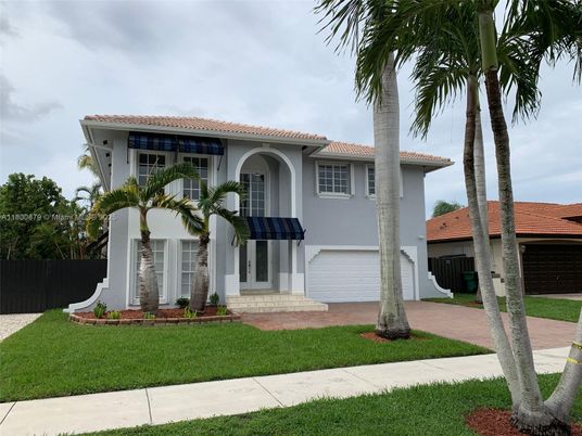 Attached, Exterior, Facade, Spanish Mediterranean