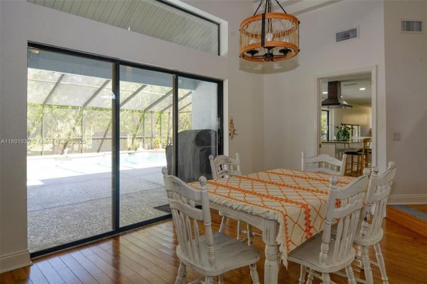 Dining room, Interior, Pendant Lights, Sun Room, Wood Texture Flooring