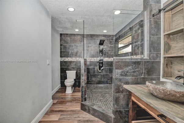 Bathroom, Glass Shower, Interior, Recessed Lighting, Wood Texture Flooring