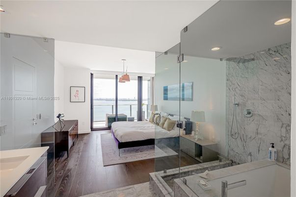 Bathroom, Bedroom, Glass Shower, Interior, Marble Walls, Recessed Lighting, Wood Texture Flooring