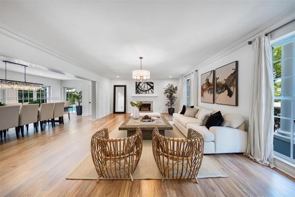 Dining room, Fireplace, Interior, Living room, Pendant Lights, Recessed Lighting, Wood Texture Flooring