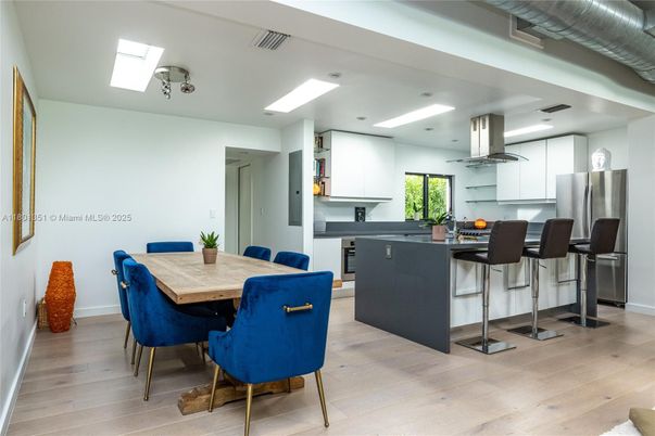 Dining room, Interior, Kitchen, Recessed Lighting, Stainless Steel Appliances, Wood Texture Flooring