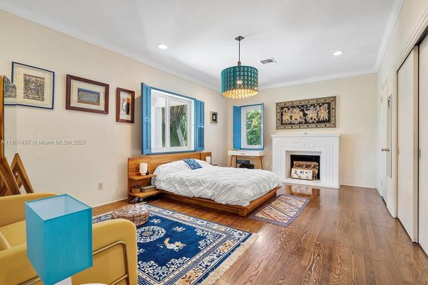 Bedroom, Chandelier, Fireplace, Interior, Recessed Lighting, Wood Texture Flooring